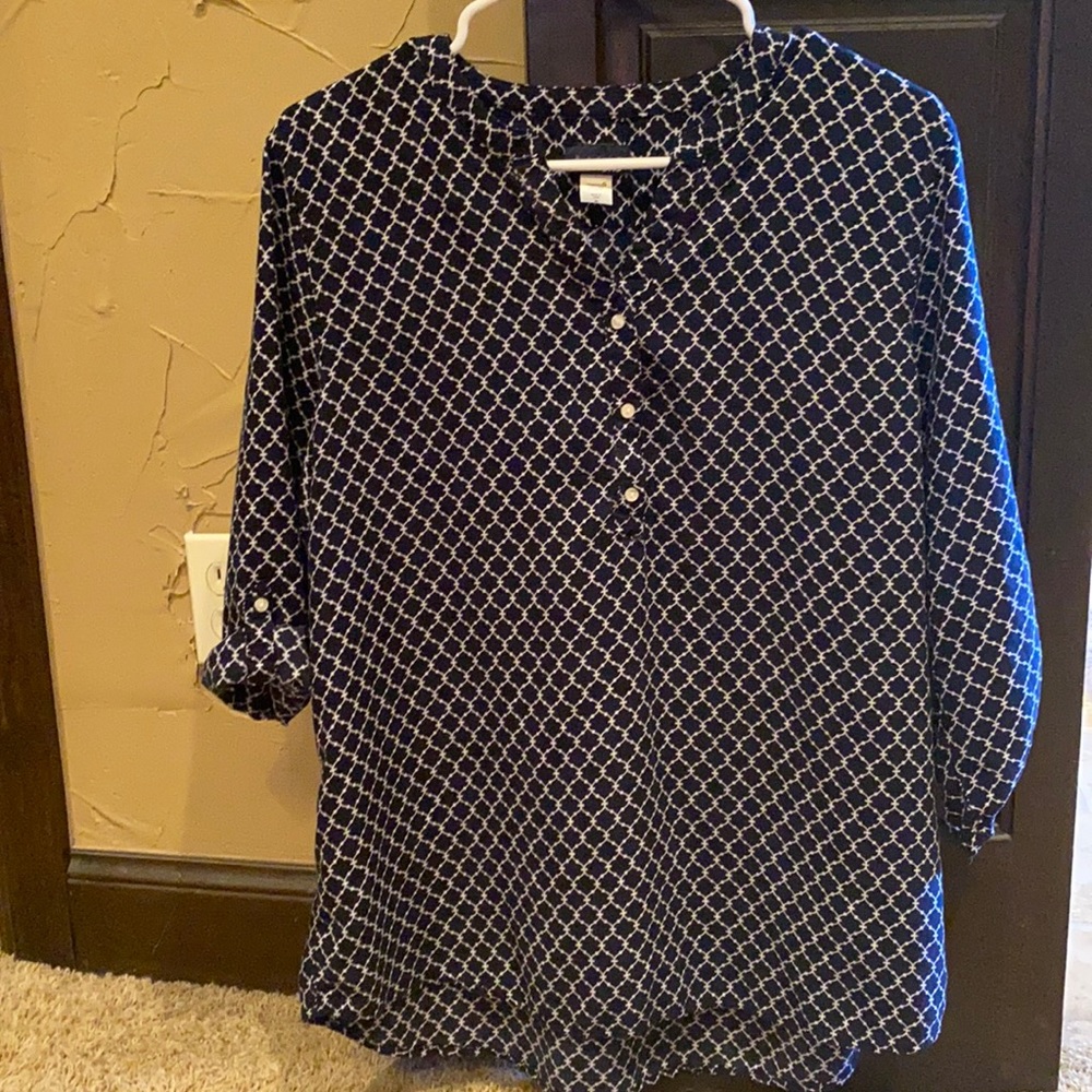 Navy and cream colored blouse